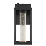 Juno 4.75" Industrial Vintage Iron/Glass Seeded Glass with Dusk-to-Dawn Sensor Integrated LED Outdoor Sconce - JONATHAN Y
