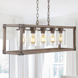 Zeniba 36" Linear Adjustable Iron/Seeded Glass Rustic Farmhouse LED Pendant - JONATHAN Y