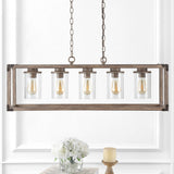Zeniba 36" Linear Adjustable Iron/Seeded Glass Rustic Farmhouse LED Pendant - JONATHAN Y