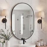 Milly 24 in. W x 36 in. H Medium Oval Metal Framed Wall Mirror - JONATHAN Y