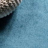 Haze Solid Low-pile Area Rug Turquoise