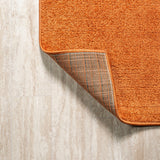 Haze Solid Low-pile Area Rug Orange