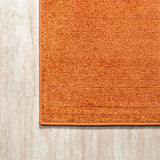 Haze Solid Low-pile Area Rug Orange