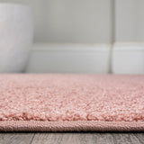 Haze Solid Low-pile Area Rug Pink