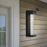 Miranda 5.13" Modern Industrial Iron/Glass Seeded Glass with Dusk-to-Dawn Sensor Integrated LED Outdoor Sconce - JONATHAN Y