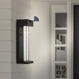 Miranda 5.13" Modern Industrial Iron/Glass Seeded Glass with Dusk-to-Dawn Sensor Integrated LED Outdoor Sconce - JONATHAN Y