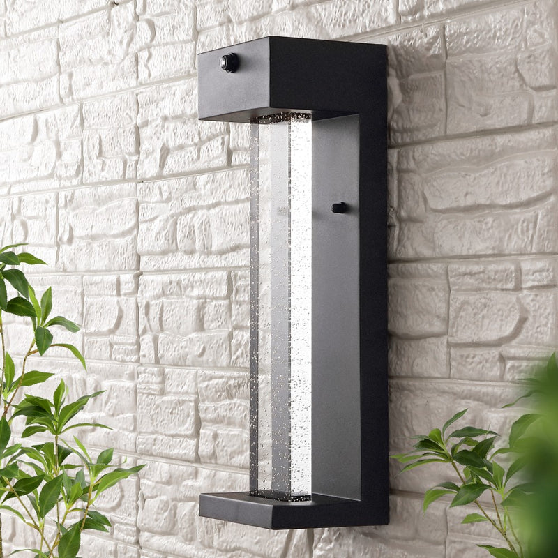Miranda 5.13" Modern Industrial Iron/Glass Seeded Glass with Dusk-to-Dawn Sensor Integrated LED Outdoor Sconce - JONATHAN Y