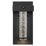 Horizone 5.5" Minimalist Industrial Iron/Glass Seeded Glass with Dusk-to-Dawn Sensor Integrated LED Outdoor Sconce - JONATHAN Y