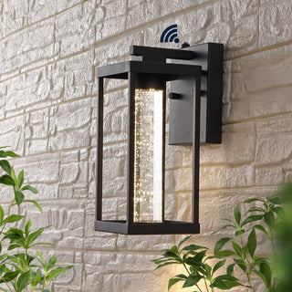 Juno 4.75" Industrial Vintage Iron/Glass Seeded Glass with Dusk-to-Dawn Sensor Integrated LED Outdoor Sconce - JONATHAN Y