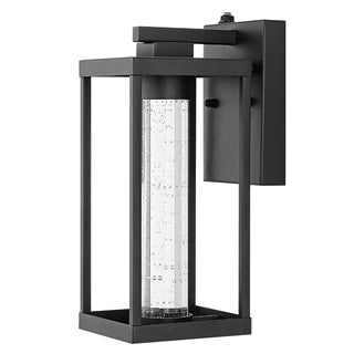 Juno 4.75" Industrial Vintage Iron/Glass Seeded Glass with Dusk-to-Dawn Sensor Integrated LED Outdoor Sconce - JONATHAN Y
