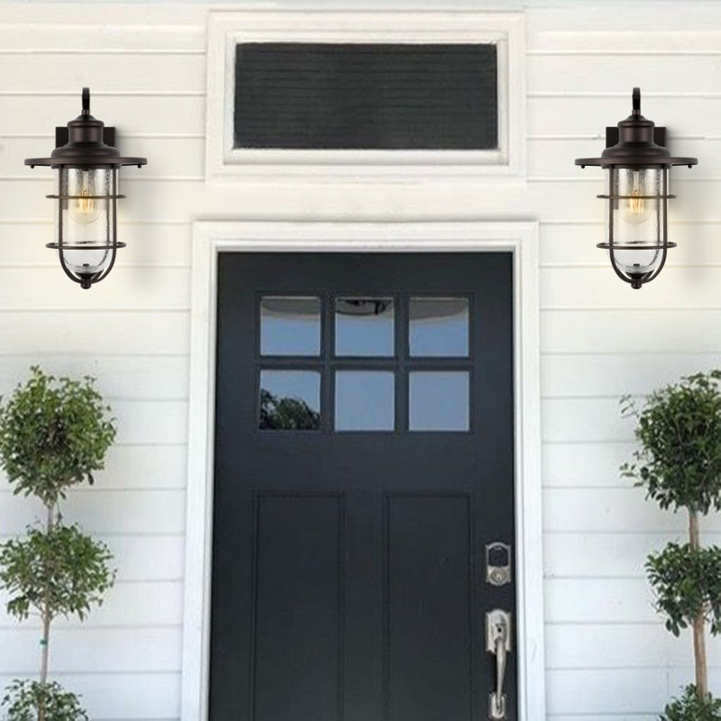 Westfield 10.5" Iron/Seeded Glass Rustic Industrial Cage LED Outdoor Lantern - JONATHAN Y
