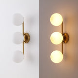 Nash 23 in. 3-Light Mid-Century Modern Metal and Frosted Glass Globe LED Vanity Light