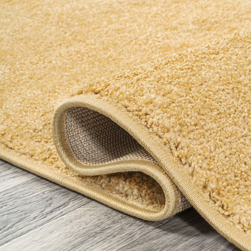 Haze Solid Low-pile Area Rug Mustard