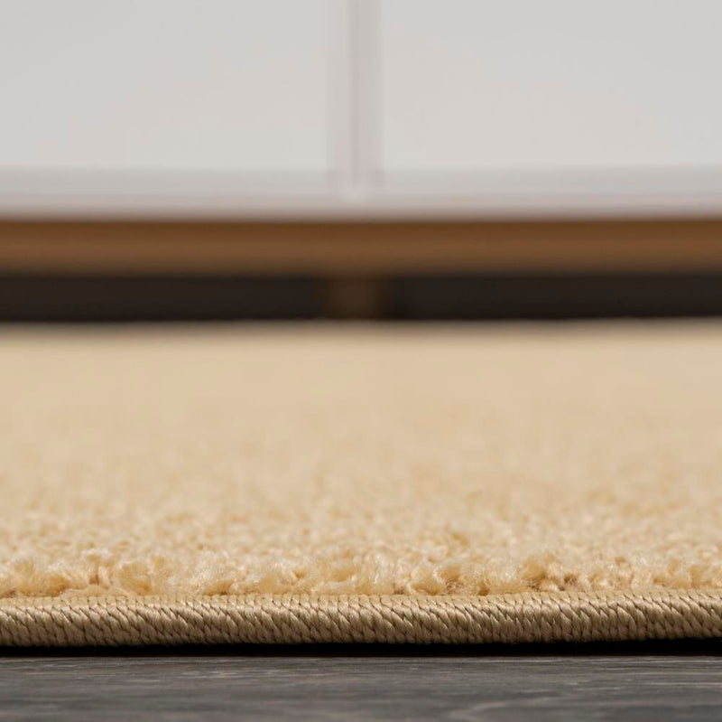 Haze Solid Low-pile Area Rug Mustard