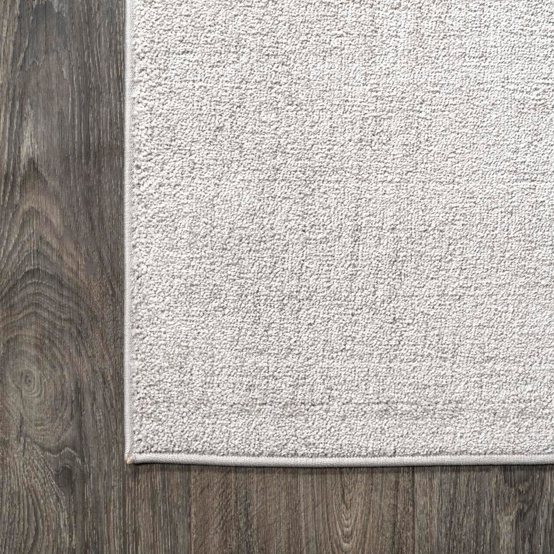 Haze Solid Low-pile Area Rug Ivory