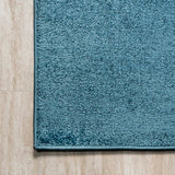 Haze Solid Low-pile Area Rug Turquoise