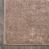Haze Solid Low-Pile Area Rug Brown