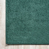Haze Solid Low-pile Area Rug Emerald
