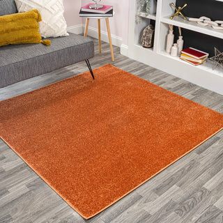 Haze Solid Low-pile Area Rug Orange
