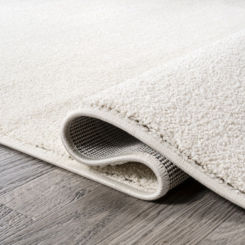 Haze Solid Low-pile Area Rug Cream