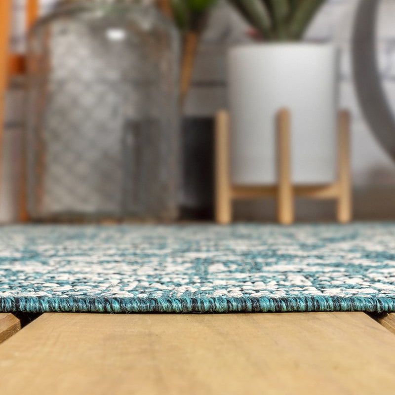 Tela Bohemian Textured Weave Floral Indoor/outdoor Round Rug