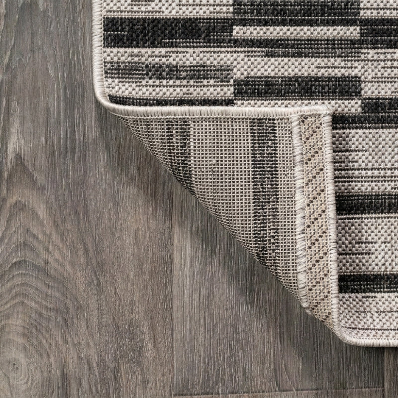 Sukie Modern Offset Stripe Indoor/outdoor Area Rug Black/Ivory / Runner / 2'2" X 8' – BACK