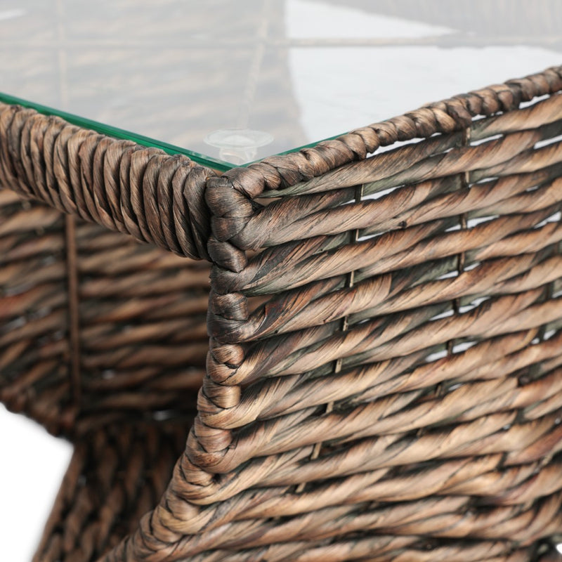 suraya-14-coastal-bohemian-handwoven-water-hyacinth-sculptural-twisted-end-table-with-glass-top-and-storage-shelf