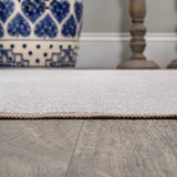 Twyla Classic Solid Low-Pile Machine-Washable Area Rug