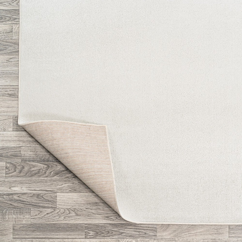 Twyla Classic Solid Low-Pile Machine-Washable Area Rug