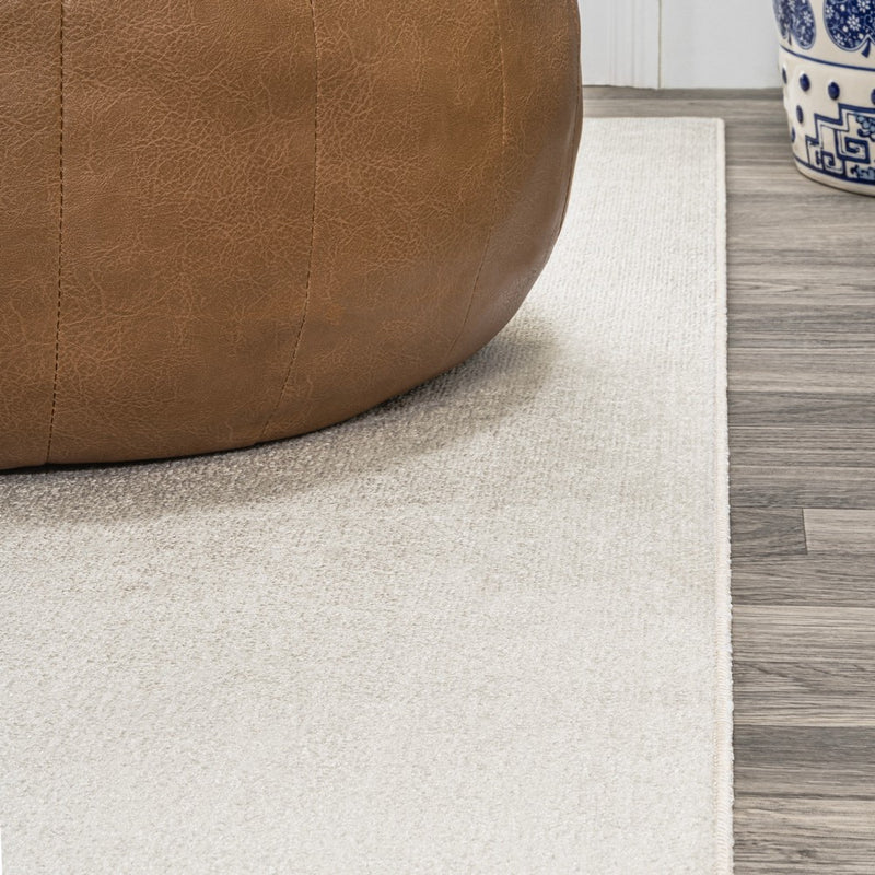 Twyla Classic Solid Low-Pile Machine-Washable Area Rug