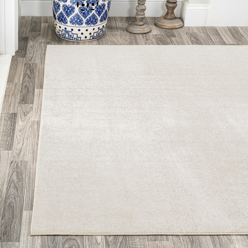 Twyla Classic Solid Low-Pile Machine-Washable Area Rug