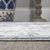 Keesha Bold Distressed Medallion Low-Pile Machine-Washable Area Rug