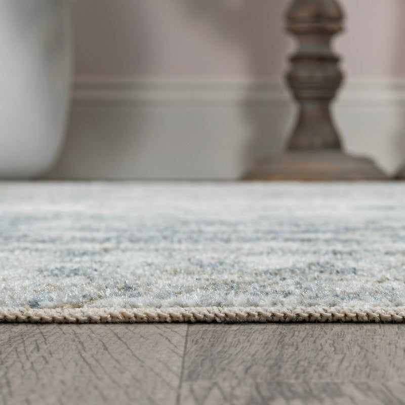 Pavel Distressed Medallion Low-Pile Machine-Washable Area Rug