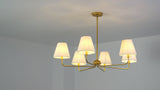 Pauline Coastal Contemporary Adjustable Swooping Arm Candle-Style Metal LED Chandelier