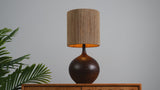 Abram 22.75" Rustic Bohemian Resin/Metal Round Table Lamp with Paper Rope Shade