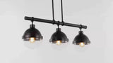 Caleb 33" Industrial Farmhouse Iron/Glass Linear LED Pendant
