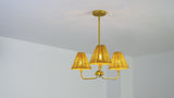 Pauline Coastal Contemporary Adjustable Swooping Arm Candle-Style Metal LED Chandelier