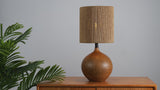 Abram 22.75" Rustic Bohemian Resin/Metal Round Table Lamp with Paper Rope Shade