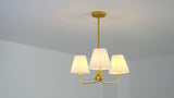 Pauline Coastal Contemporary Adjustable Swooping Arm Candle-Style Metal LED Chandelier