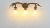 Wyatt Southwestern Bohemian Resin/Seeded Glass Faux Antler LED Vanity Light