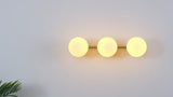 Nash 23 in. 3-Light Mid-Century Modern Metal and Frosted Glass Globe LED Vanity Light